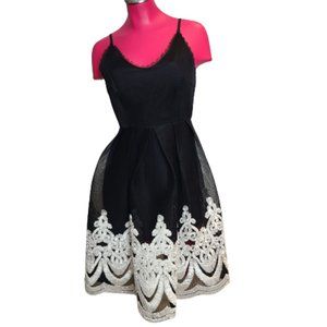 Stunning Black Cocktail Dress with White Accents by Jenn